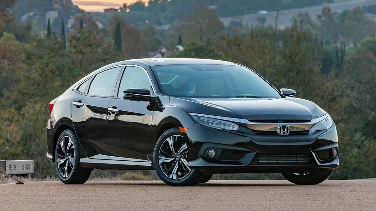 2017 Honda Civic in black with hills in the background.
