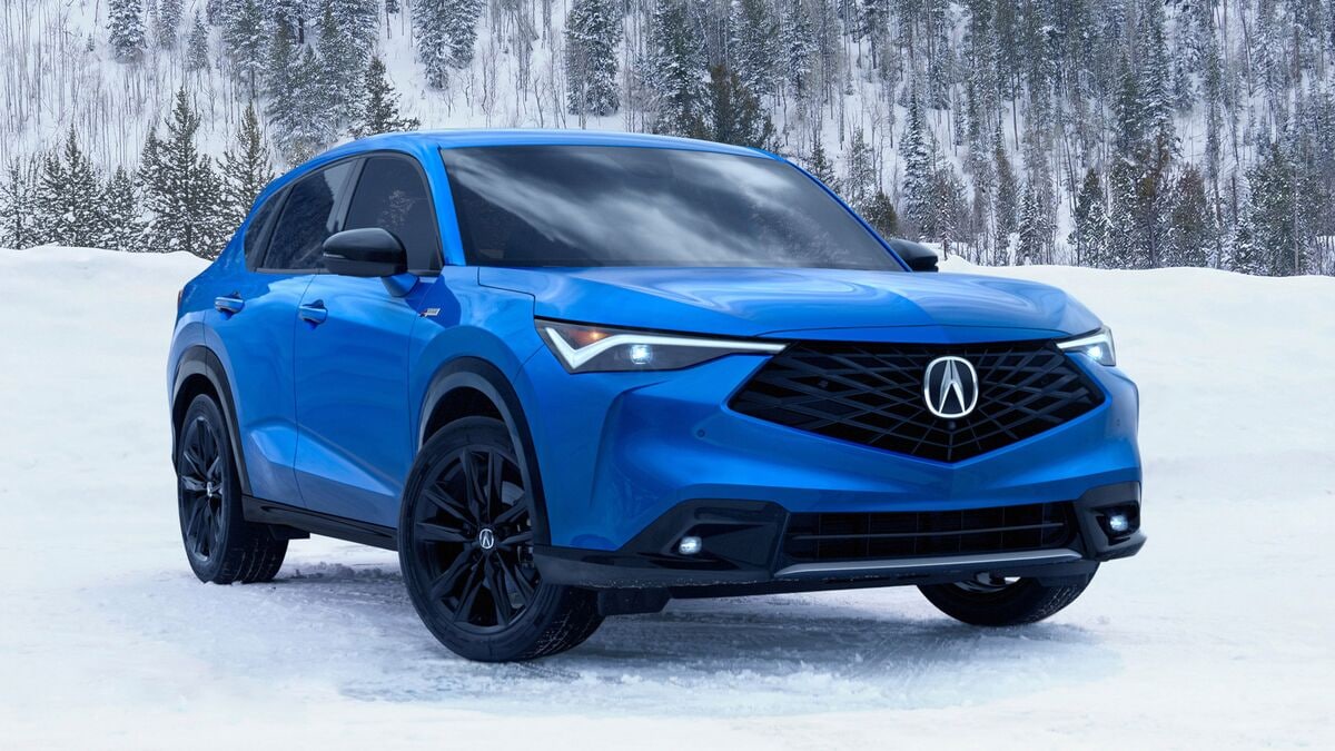 Blue 2026 Acura ADX A-Spec in the snow.