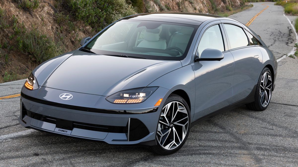 2025 Hyundai IONIQ 6 on a mountain road at sunrise.