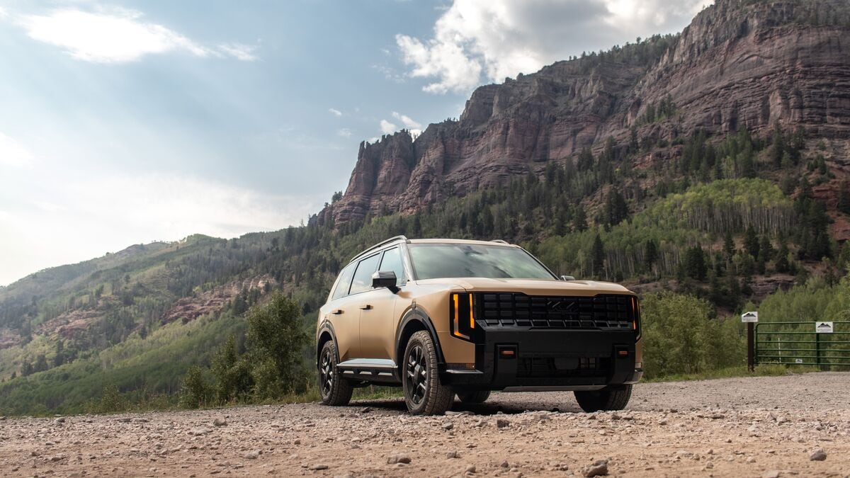 2027 Kia Telluride low wide angle below mountains