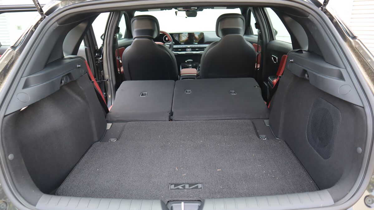 2026 Kia K4 Hatchback rear view of the cargo area with the passenger seats folded