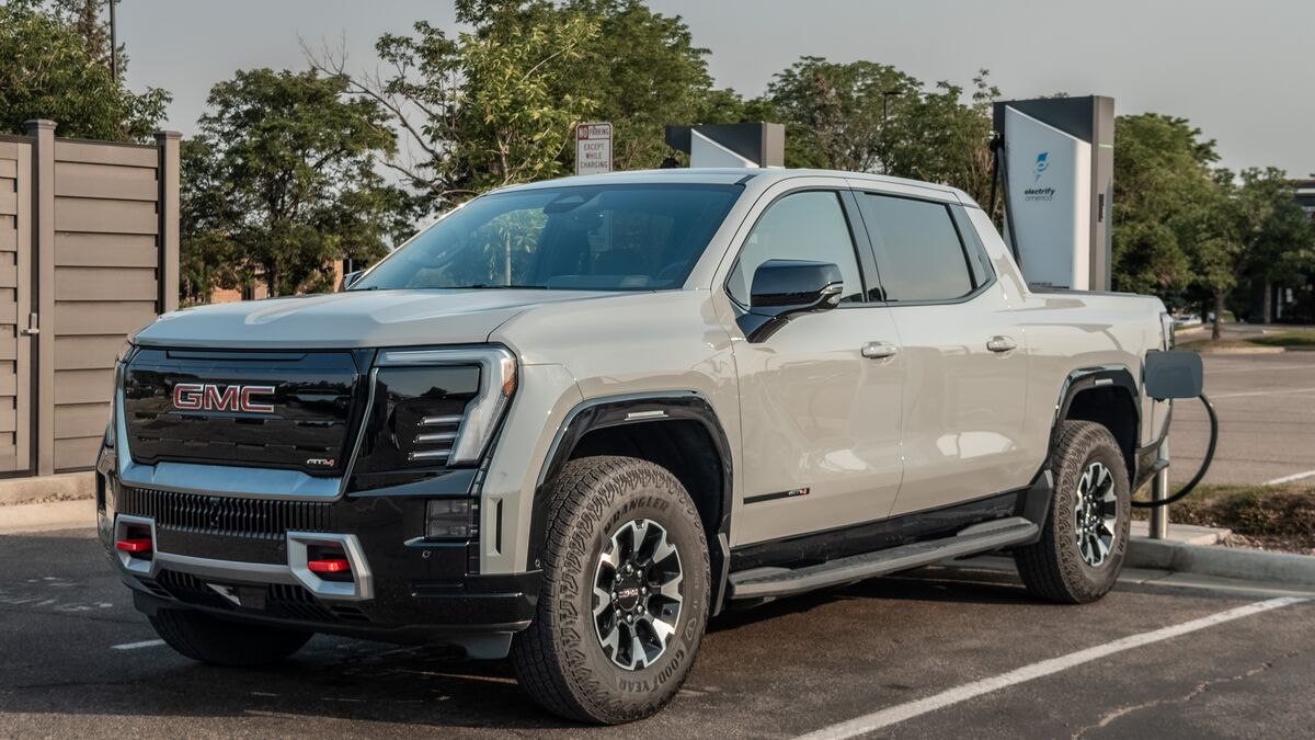 2026 GMC Sierra EV AT4 charging at Electrify America