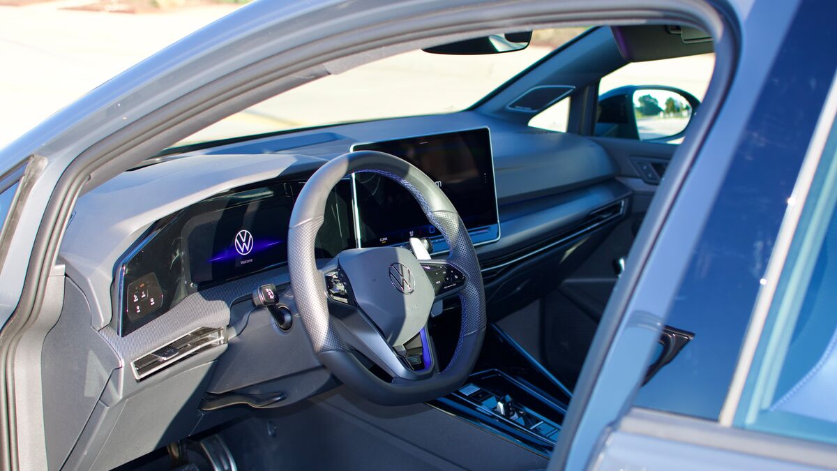 A 2026 Volkswagen Golf R inside on the driver's side.