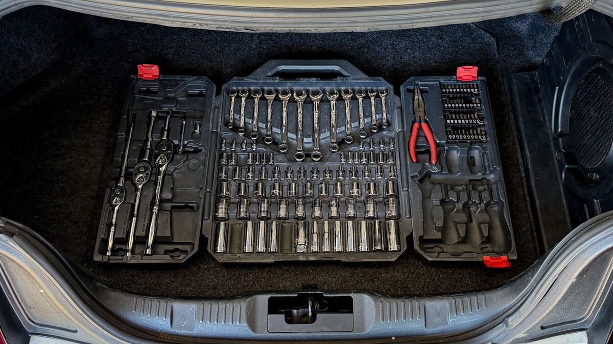 A 200-piece mechanic's tool set in a car trunk.