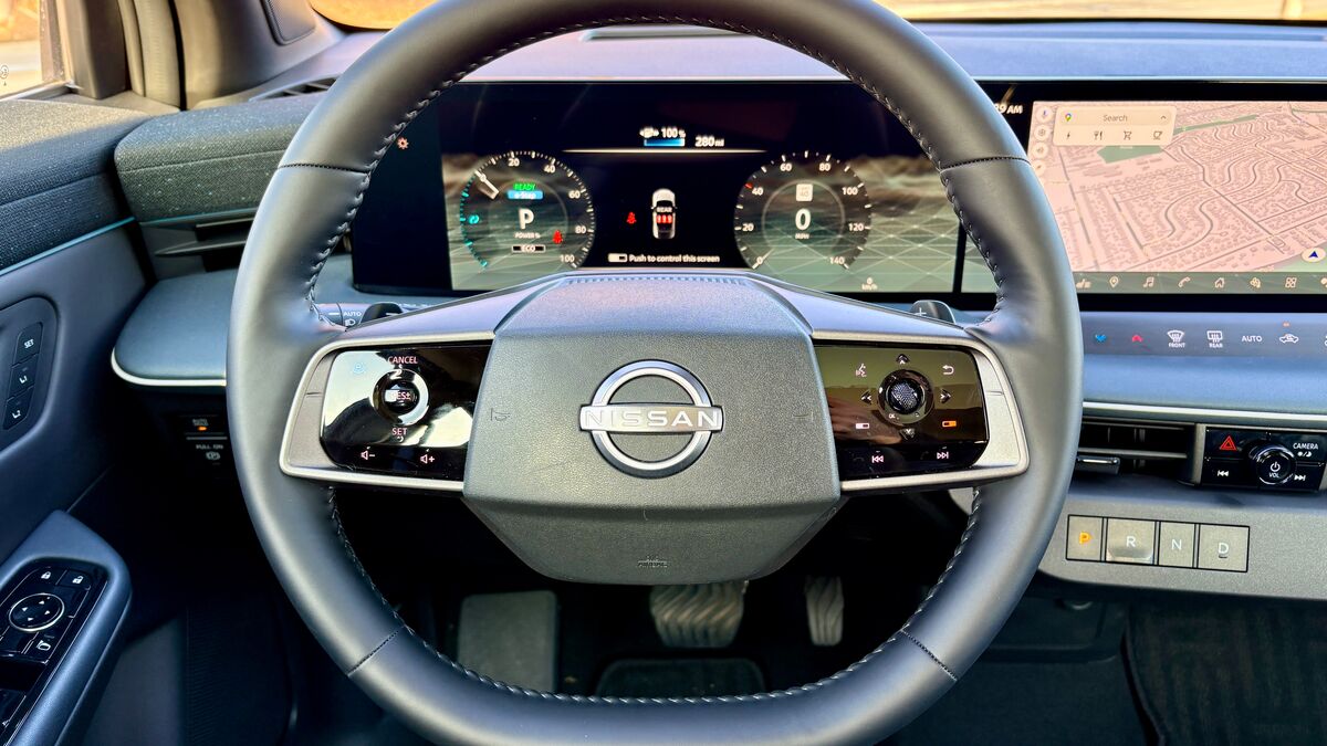 2026 nissan leaf ev interior detail photo of the steering wheel and dash board