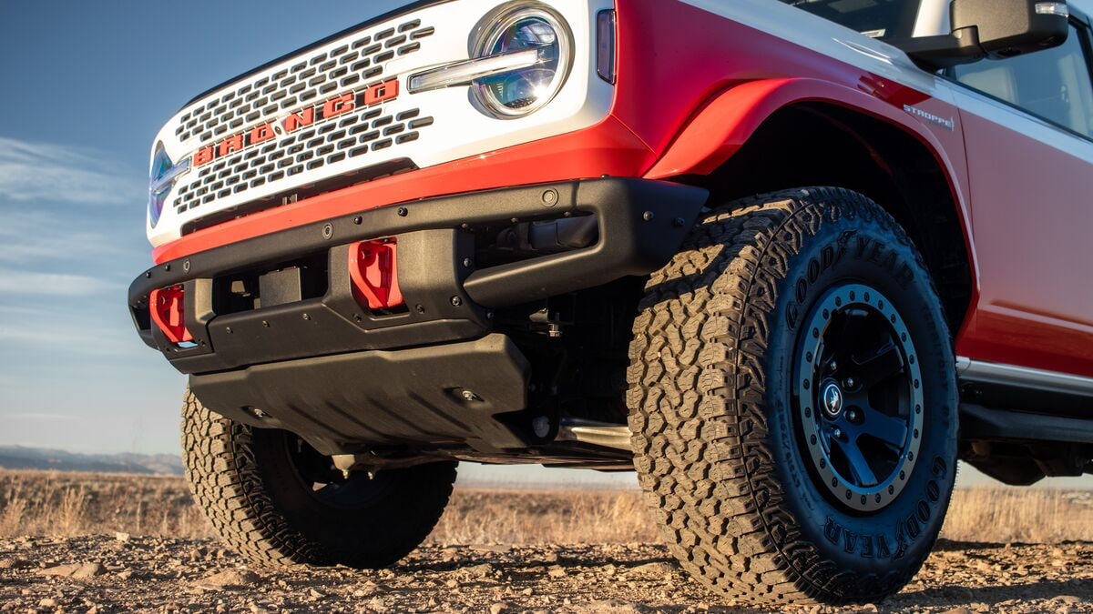 2025 Bronco Stroppe front end approach angle parked on dirt road.