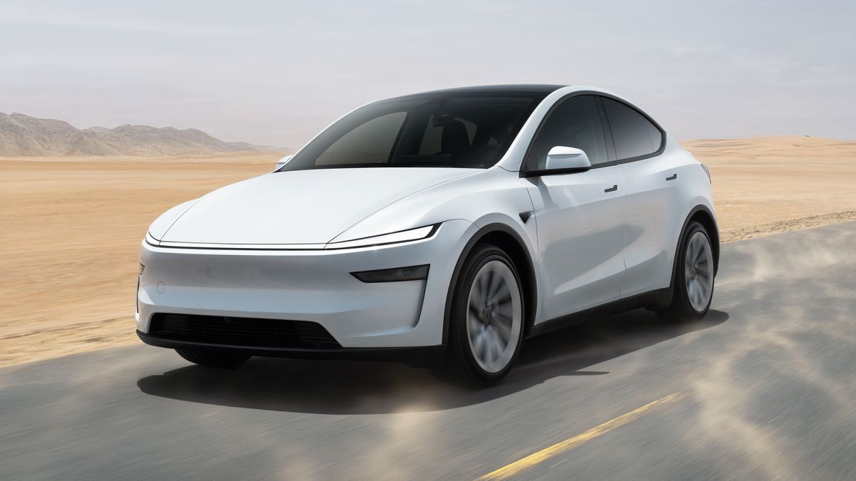 2026 Yesla Model Y driving on a road.