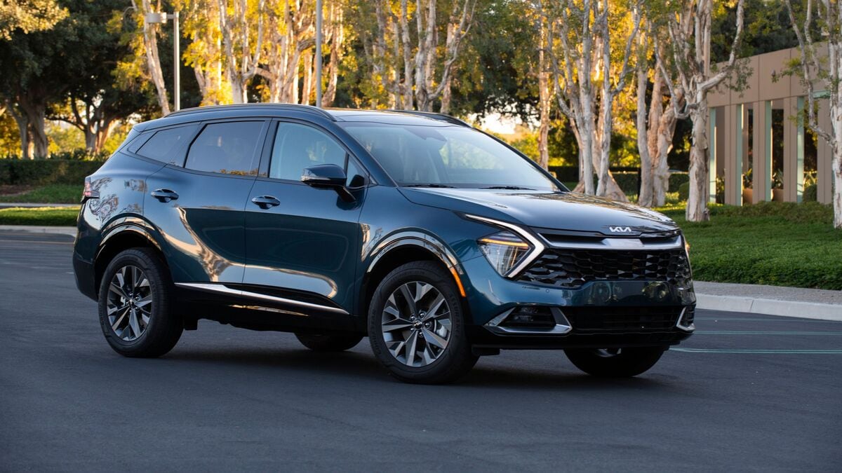 2025 Kia Sportage Hybrid parked in and around Irvine office parking lot.
