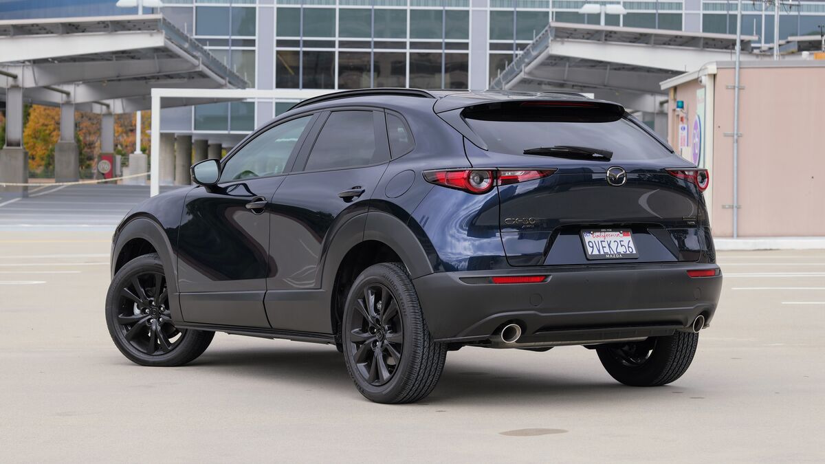 Rear end of 2026 Mazda CX-30 in dark blue.