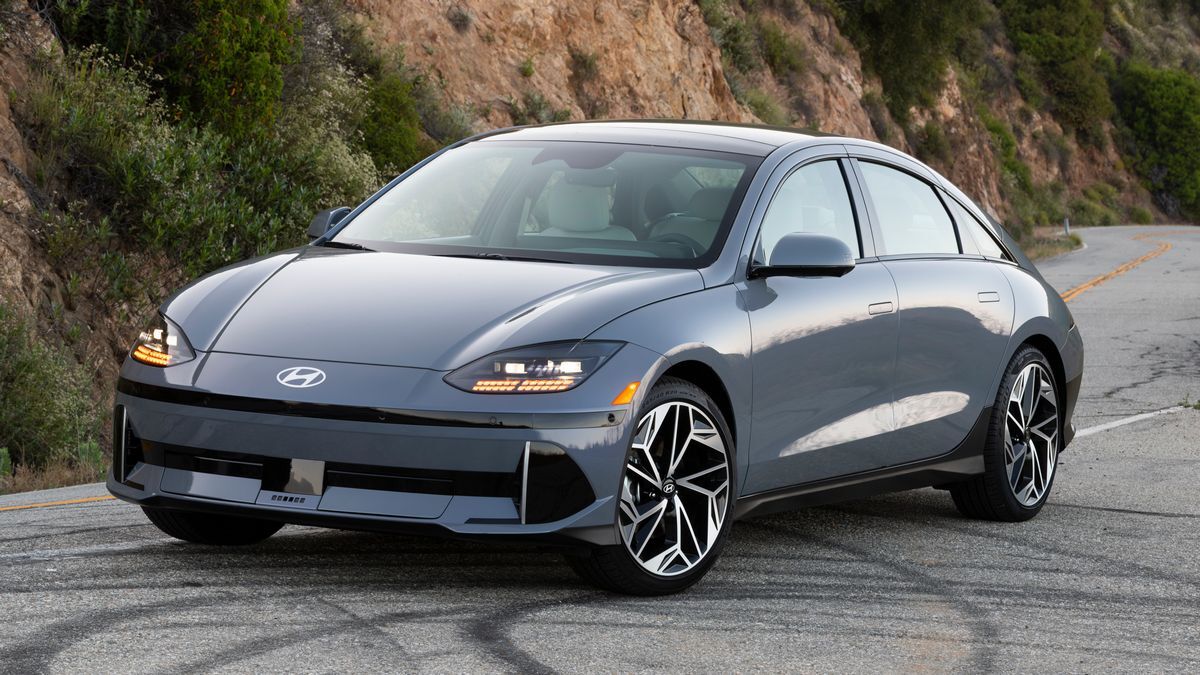 2025 Hyundai IONIQ 6 on a mountain road at sunrise.