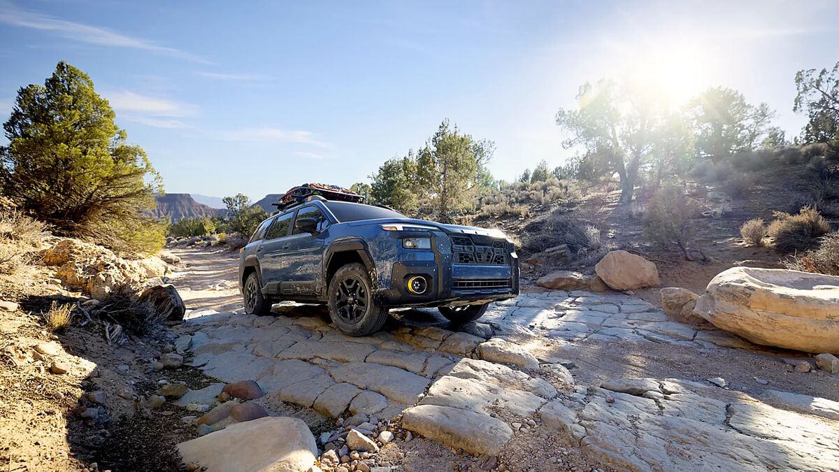 2026 Subaru Outback parked on rocky roads.