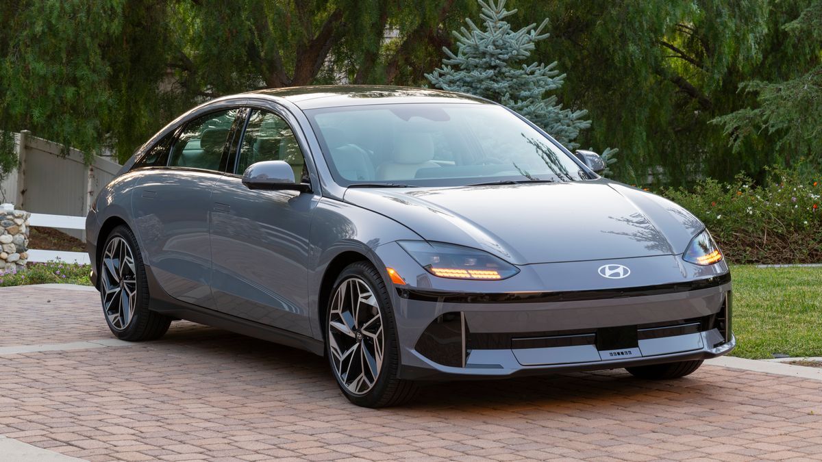 2025 Hyundai IONIQ 6 on a mountain road at sunrise.
