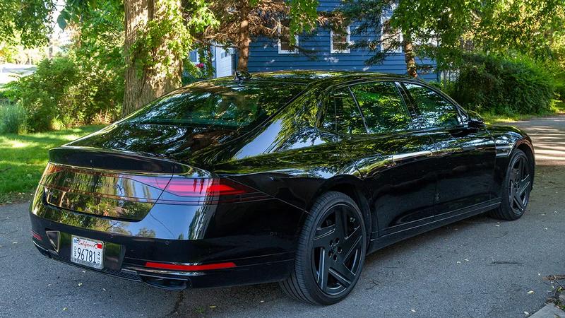 2026 Genesis G90 3.5T E-SC MHEV Prestige Black AWD in a suburban driveway