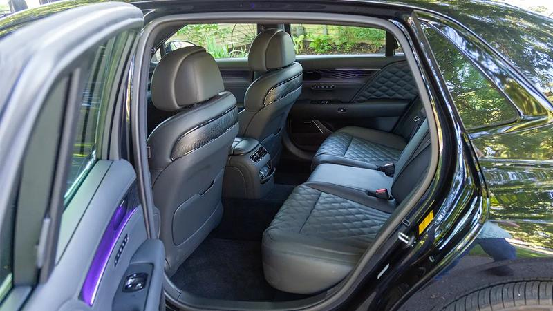 2026 Genesis G90 3.5T E-SC MHEV Prestige Black AWD in a suburban driveway