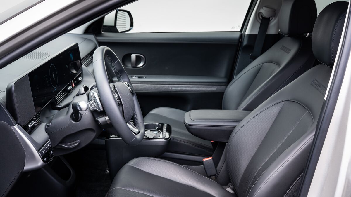 A detailed interior photo of the front seats taken from the left side of the Hyundai Ioniq 5.