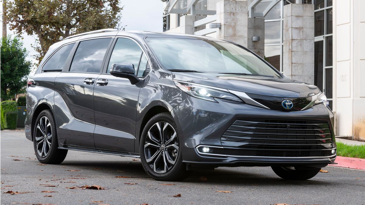 2026 Toyota Sienna in gray parked near a building.