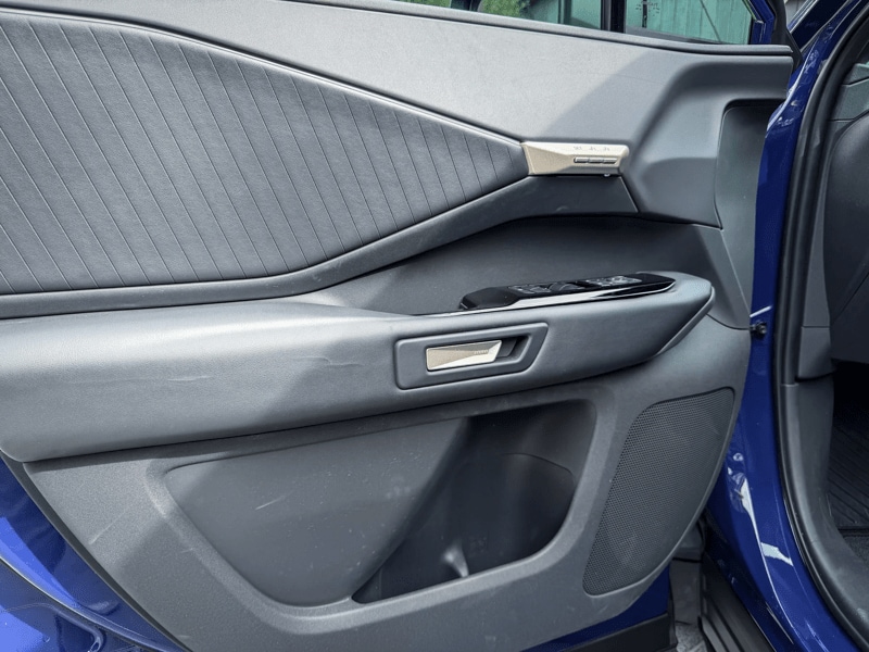 2027 Toyota Highlander dark interior door card