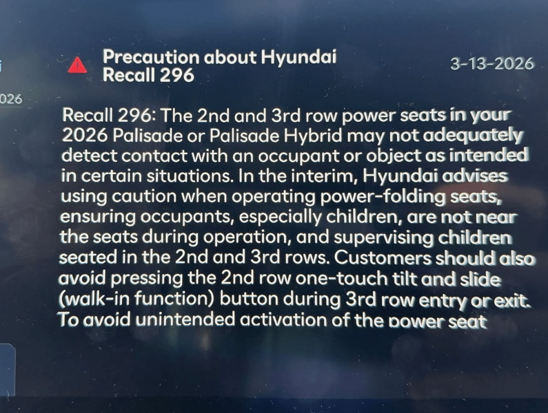 A pop-up notification about the 2026 Hyundai Palisade and Calligraphy recall.