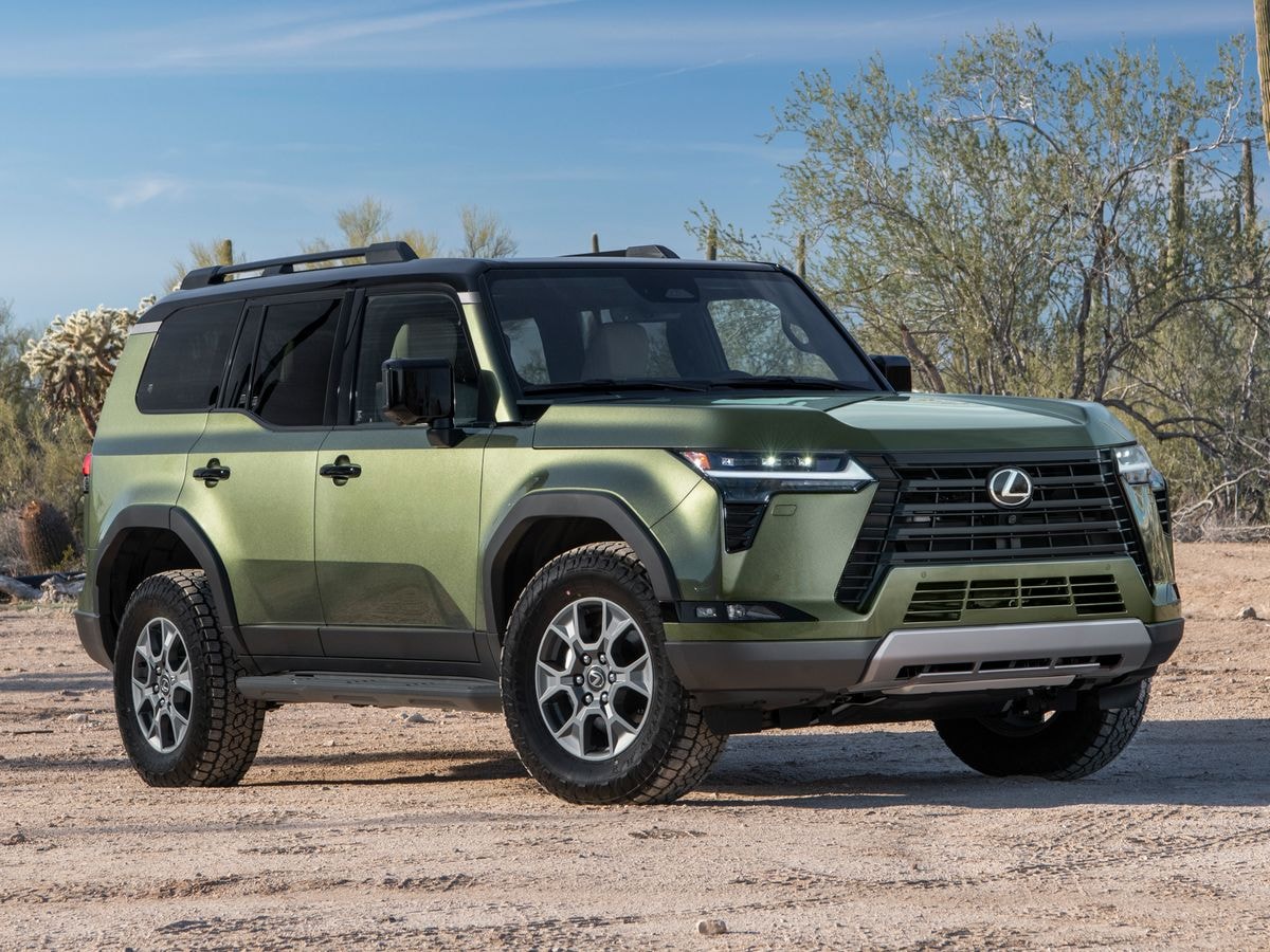 2024 Lexus GX Overtrail in Nori Green with saguaro cactus in the background.