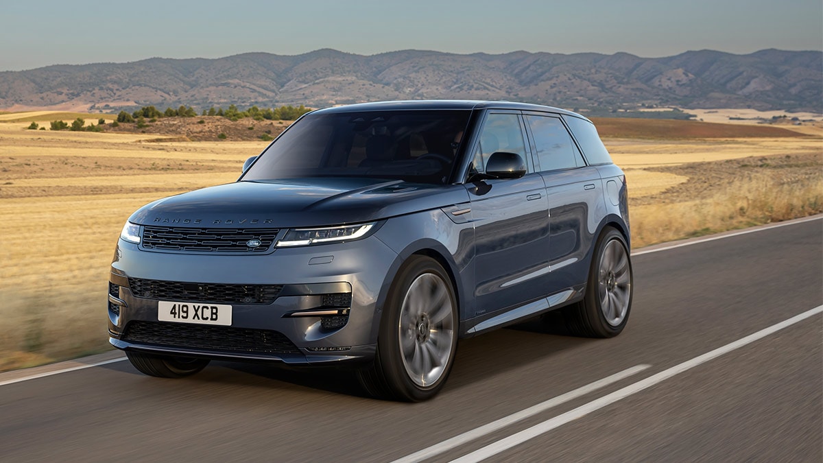 2024 Land Rover Range Rover driving on the road.