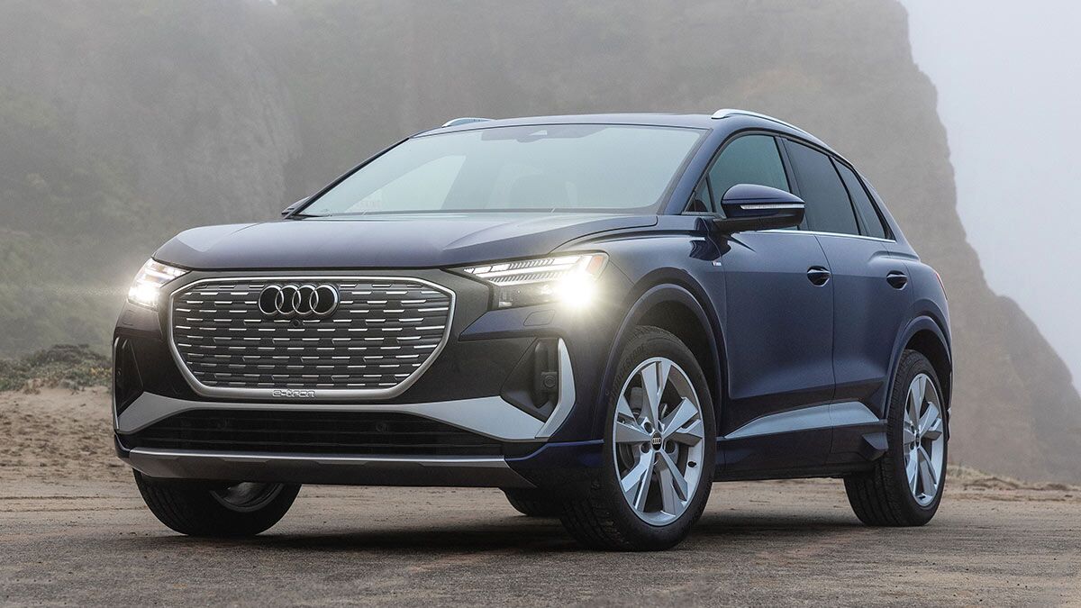2025 Audi Q4 e-tron parked with a misty mountain in the background/