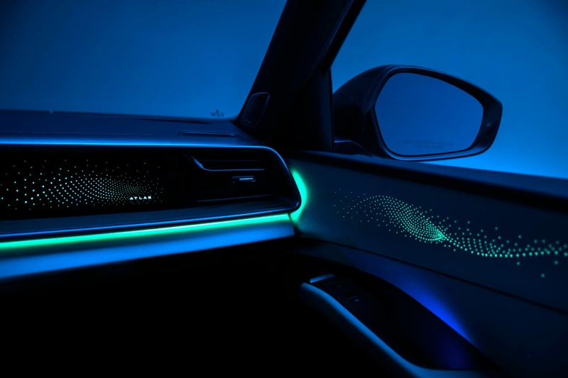 interior mood lighting from the 2027 Volkswagen Atlas in a dark room with a blue background