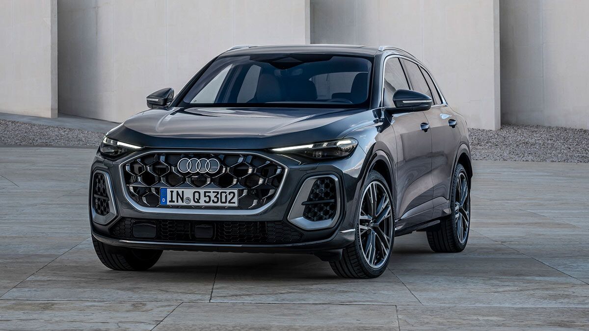 2025 Audi Q5 parked in front of a building.