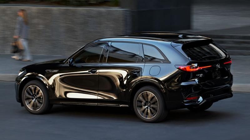 2025 Mazda CX-70 driving on a street.