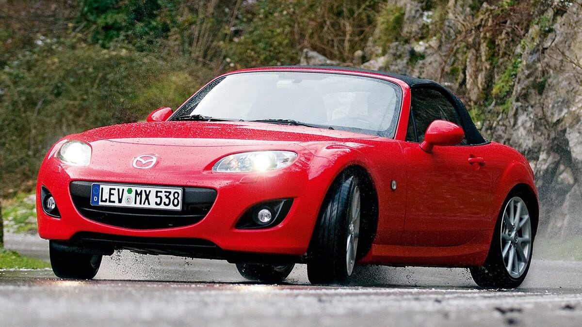 2010 Mazda MX-5 Miata in red.
