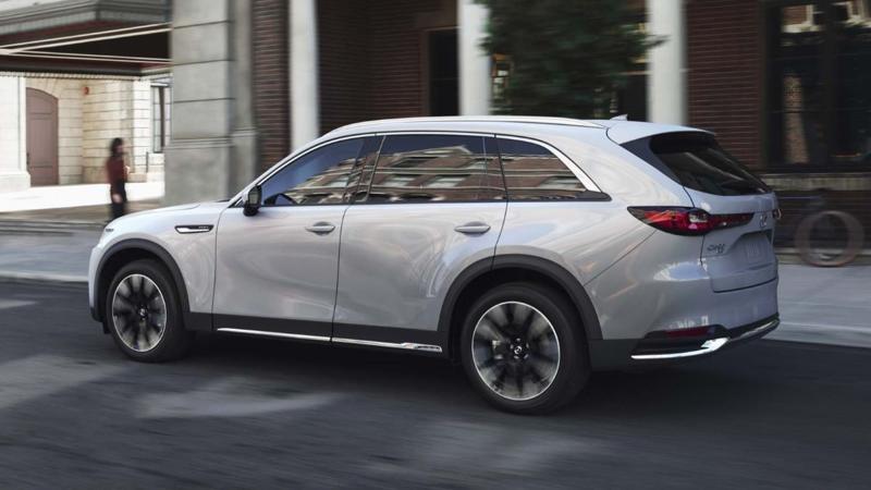 Rear view of the all-new 2024 Mazda CX-90 PHEV three-row midsize SUV