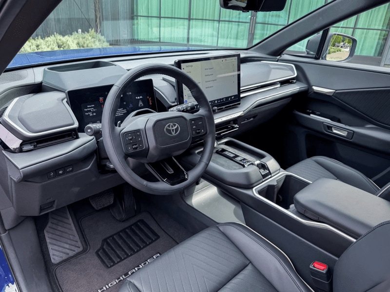 2027 Toyota Highlander dark interior front cockpit view