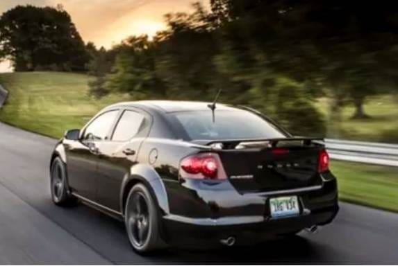 2013-dodge-avenger-blacktop-black-rear-action-600-001
