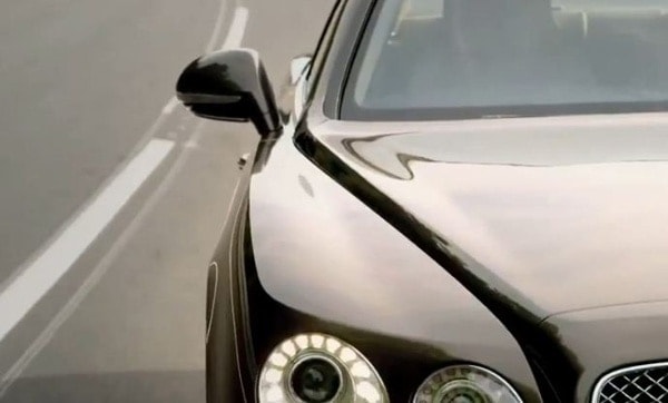 2014-bentles-flying-spur-teaser-front-headlamp-600-001-1