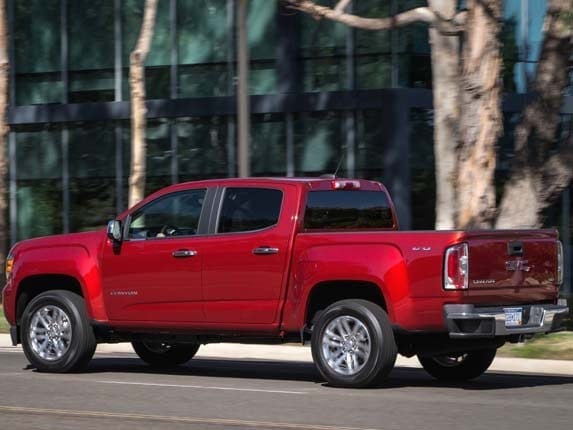 2016-gmc-canyon-sle-duramax-rear-side-action1-lead-600-001