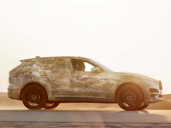 2017-jaguar-f-pace-crossover-prototype-hot-testing-pan-action1-600-001