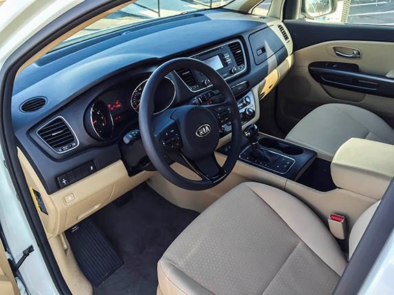 2015-kia-sedona-lx-interior-driver-600-001