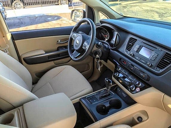 2015-kia-sedona-lx-interior-passenger-600-001