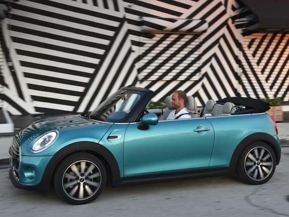 2016-mini-convertible-high-open-front-side-action1-600-001