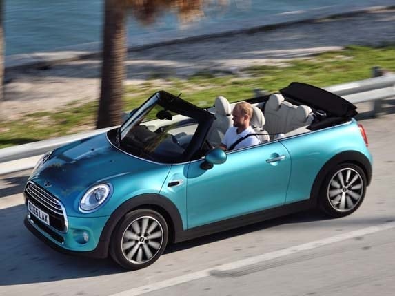 2016-mini-cooper-open-high-side-front-action7-600-001