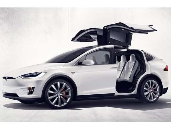 2016-tesla-model-x-static-front-side-door-open1-lead-600-001