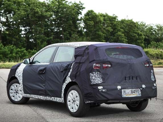 kia-niro-production-model-rear-static-disguised1-600-001