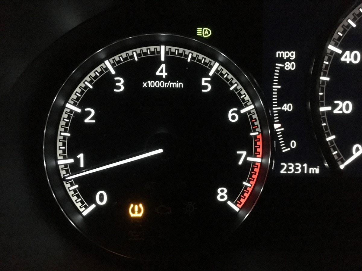 TPMS symbol lit up on vehicle dashboard