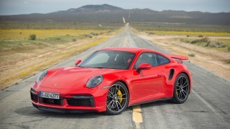 2021 Porsche 911 Turbo S Coupe Front Left Quarter On Road Tall