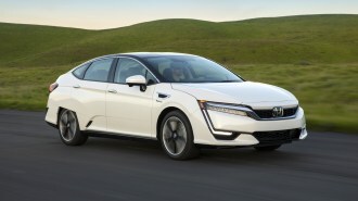 RT 2019 Honda Clarity Fuel Cell White Action Front Quarter Right