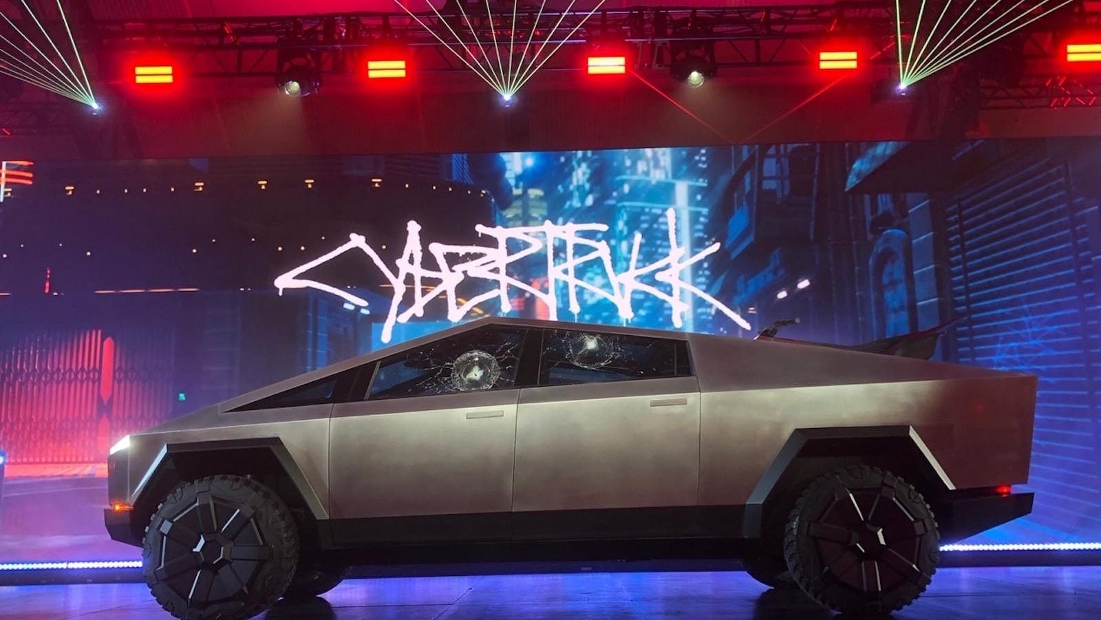The Tesla Cybertruck at its premiere with broken windows