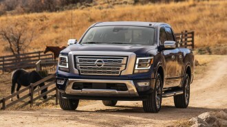 2021 Nissan Titan blue on farm