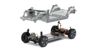 An EV body lifted to show its battery pack