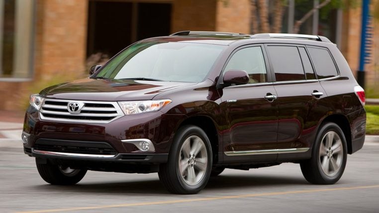2011 Toyota Highlander in maroon.