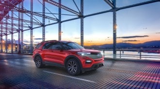 2021 Ford Explorer Enthusiast ST Driving Front Three Quarter