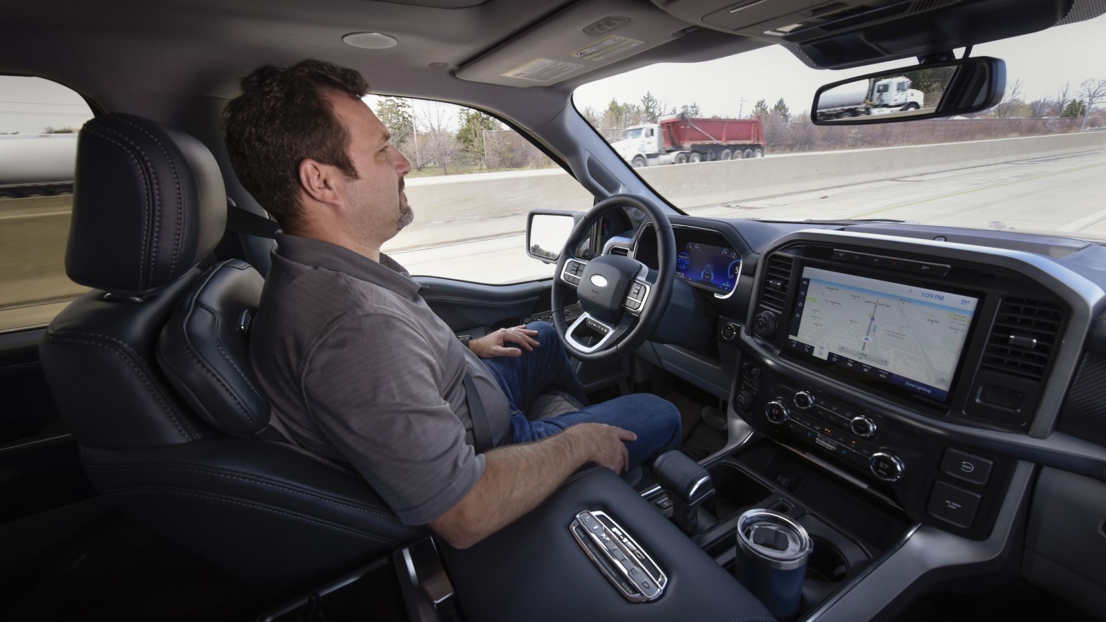 A driver tests Ford's BlueCruise hands free system
